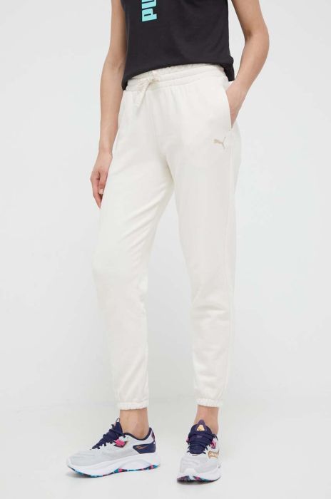 Бавовняні спортивні штани Puma колір бежевий однотонні